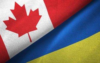 Ukraine and Canada flag together realtions textile cloth fabric texture